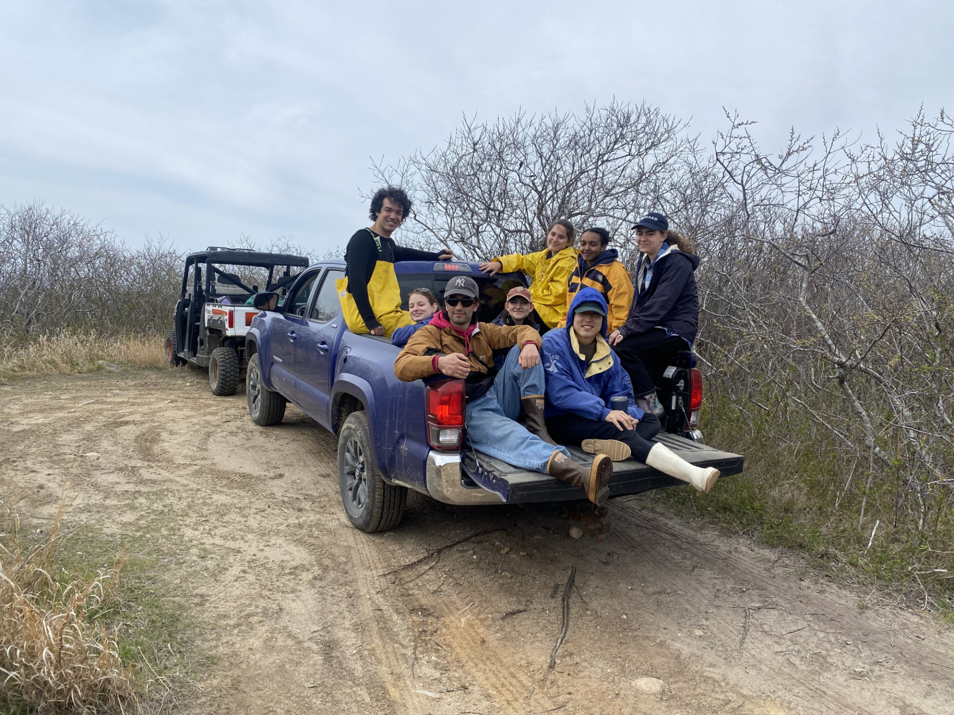 Work crew off to the beach and oyster farm