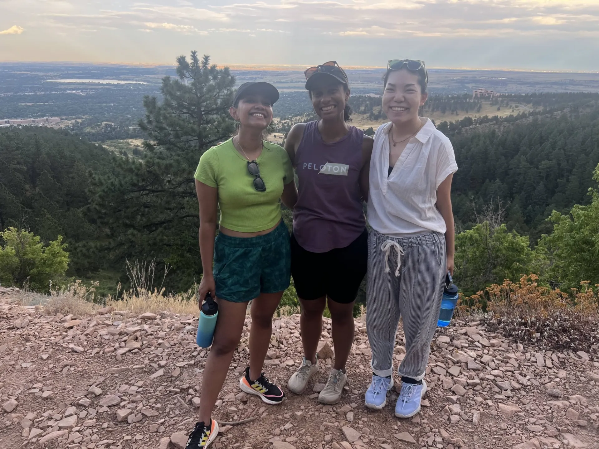 Aadishah, Ari, and Ibuki hiking in the Flatirons.